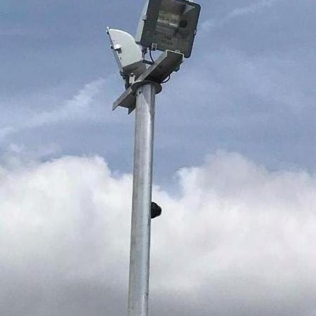 Maintenance d'éclairage extérieur sur un parking à Thillois.